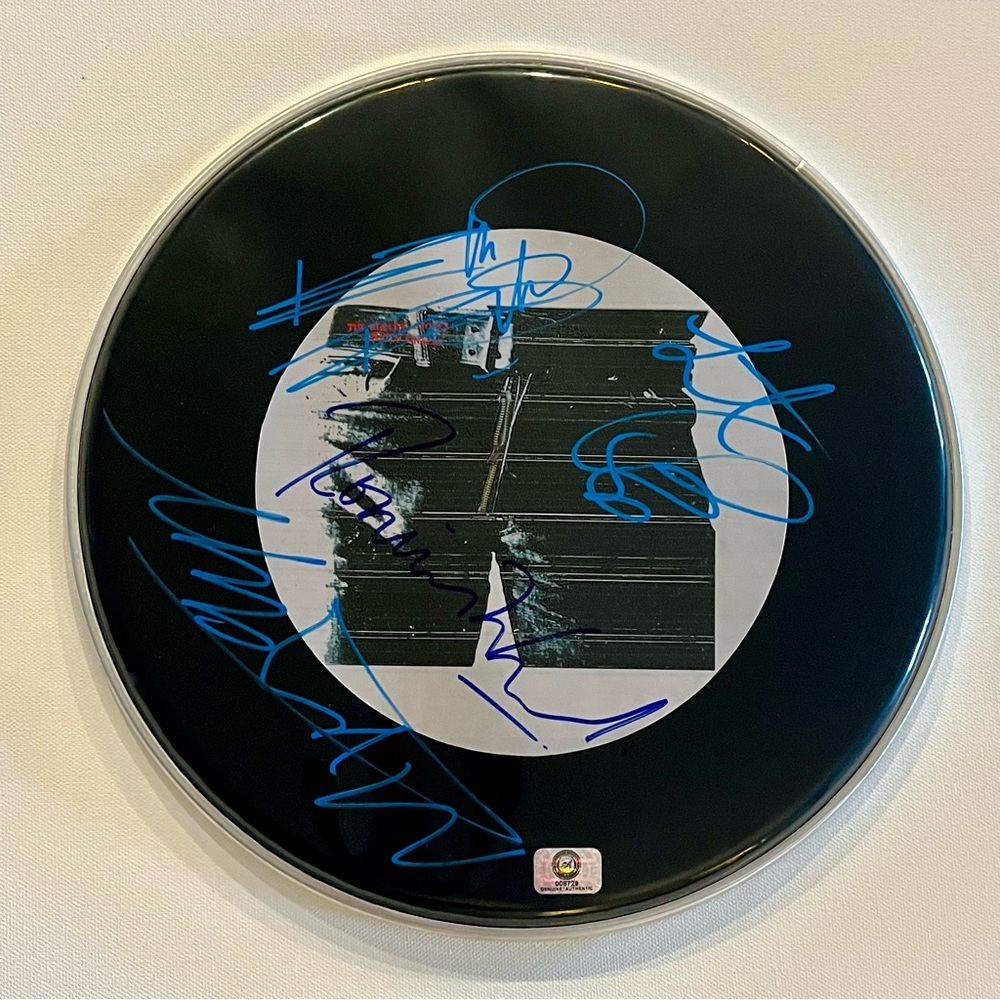 Sticky Fingers Drumhead signed by The Rolling Stones, COA